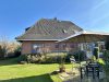 Familienidyll im Grünen – Wohnhaus mit gemütlicher Einliegerwohnung - Gartenansicht