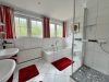 Einzigartiges Architektenhaus mit großzügigem Garten in begehrter Dorflage - Kinder-Badezimmer