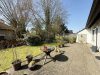Familientraum mit Einliegerwohnung in Stuhr-Moordeich - mit Zugang zur Terrasse und tollem Blick in den Garten