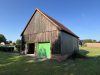 Großzügiges Bauernhaus auf weitläufigem Grundstück – perfekt für Ihre Ideen - Scheune mit Garagen