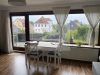 Wohnung im 1. Obergeschoss in zentraler Lage - Wohnzimmer