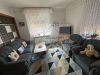 Freistehendes Einfamilienhaus mit Einliegerwohnung zu verkaufen - Wohnzimmer