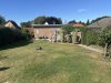Bungalow in attraktiver Wohnsiedlung zu verkaufen - Garten