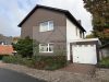 Besonderes Einfamilienhaus mit großem Garten in zentraler Lage - Garage