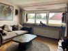 Zentrale und gepflegte Immobilie in Sulingen - Wohnzimmer DG
