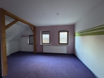 Renovierungsbedürftiges Zweifamilienhaus mit Entwicklungspotenzial in Hoya/Weser - Schlafzimmer