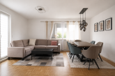 3-Zimmer-Obergeschosswohnung mit Balkon und Garage in Weyhe-Dreye - Wohnzimmer