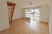 Begehrte Lage – gemütliche Singlewohnung mit Einbauküche und Carport! - Wohn- und Esszimmer
