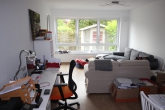 Vermietete 2-Zimmer-Wohnung mit ca. 80 m² Wohnfläche, Garten & Tiefgarage in Kirchweyhe - Wohnzimmer