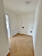 Erstbezug im Effizienzhaus 40EE – Ihr Penthouse auf Zeit - Hauswirtschaftsraum
