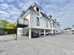 Erstbezug im Effizienzhaus 40EE – Ihr Penthouse auf Zeit - Carport