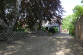 Einfamilienhaus mit Sanierungsbedarf auf großem Grundstück in ruhiger Lage von Weyhe-Leeste - Straßenansicht