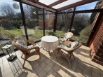 Fußläufig zum Ortskern Leeste und doch mitten in der Natur - Solides Wohnhaus mit zwei Wohneinheiten - Wintergarten