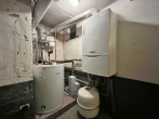 Neustadt – flexibel wohnen mit Gewerbe und großer Garage! - Gasheizung mit Warmwasserspeicher für EG-Wohnung