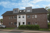 Gut vermietete 3-Zimmer-Wohnung in Weyhe-Leeste – mit Terrasse, Garten & Garage - Straßenansicht