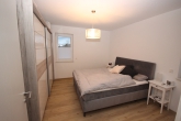 Neuwertige Wohnung mit Aufzug & Garage - Schlafzimmer