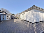 Geschmackvoller Bungalow mit Garage und moderner Technik! - Gartenansicht