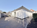 Geschmackvoller Bungalow mit Garage und moderner Technik! - Gartenansicht
