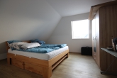 Helle, moderne Dachgeschosswohnung mit Garage zentral in Weyhe-Leeste! - Schlafzimmer