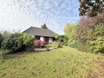 Einfamilienhaus mit Garten in familienfreundlicher Lage - Rückwärtige Hausansicht