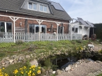 Helles, energieeffizientes Rotklinkerhaus in ländlicher Idylle mit parkähnlicher Gartenanlage - Fischteich an der Terasse