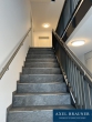 Moderne, hochwertige 3.5 Zimmer-Wohnung mit Balkon - Zentral in Brinkum-Stuhr - Treppenhaus mit Fahrstuhl