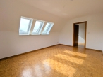Ruhige 3-Zimmer-Dachgeschosswohnung in Syke-Ristedt - Wohnzimmer