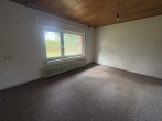 In Alleinlage individuell oder gemeinsam wohnen: Hofstelle mit zwei Wohnhäusern - Wohnhaus Nr. 12: Schlafzimmer