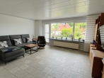 Charmantes Reihenmittelhaus mit Garage und gepflegtem Garten - Wohnzimmer