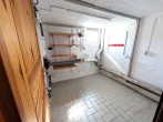 Charmantes Reihenmittelhaus mit Garage und gepflegtem Garten - Waschküche