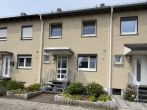 Charmantes Reihenmittelhaus mit Garage und gepflegtem Garten - Außenbild