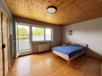Charmantes Reihenmittelhaus mit Garage und gepflegtem Garten - Schlafzimmer
