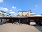 Moderne KfW-55 EG-Wohnung mit Terrasse & Carport - Carports