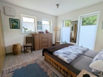 Moderne KfW-55 EG-Wohnung mit Terrasse & Carport - Schlafzimmer