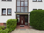 Provisionsfrei: Vermietetes Mehrfamilienhaus mit ländlicher Umgebung in Alt-Stuhr - Hauseingang