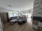 Helle Erdgeschosswohnung mit Terrasse in Bahnhofsnähe - Wohnbereich