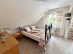 Gepflegtes Einfamilienhaus mit Kamin und Wintergarten - Schlafzimmer