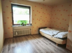 Toll für Paare oder kleine Familien: Einfacher, ebenerdiger Bungalow mit naturnahem Garten - Schlafzimmer