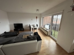 Dachgeschosswohnung in Syke zu vermieten - Wohnzimmer