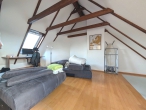 3‑Zimmer-Maisonette Wohnung mit Garage am Bürgerpark - Wohnzimmer im DG