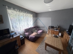 Modernisiertes Einfamilienhaus mit Nebengebäude zu verkaufen - Wohnzimmer