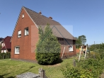Modernisiertes Einfamilienhaus mit Nebengebäude zu verkaufen - Seitenansicht
