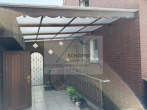Modernisiertes Einfamilienhaus mit Nebengebäude zu verkaufen - überdachter Bereich