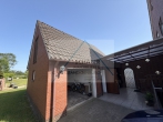 Modernisiertes Einfamilienhaus mit Nebengebäude zu verkaufen - Garage