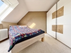 Altbau-Villa mit drei Wohneinheiten im Herzen von Delmenhorst! - DG-Wohnung – Schlafzimmer
