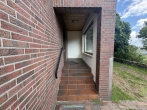 Gepflegtes Siedlungshaus mit Baugrundstück - Eingang mit Windfang