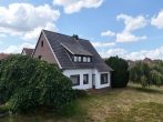 Gepflegtes Siedlungshaus mit Baugrundstück - Gepflegtes Siedlungshaus