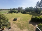 Freistehendes Zweifamilienhaus mit Rotklinker auf großem Grundstück für eine oder zwei Familien - Blick in den Garten