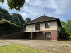 Idylle am Süstedter Bach - Bungalow mit herrlichem Garten - Blick vom Hof