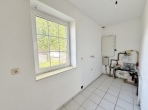 Traumhaft – Einfamilienhaus mit Garage und Südwest-Garten in Top-Lage! - EG – Hauswirtschaftsraum
